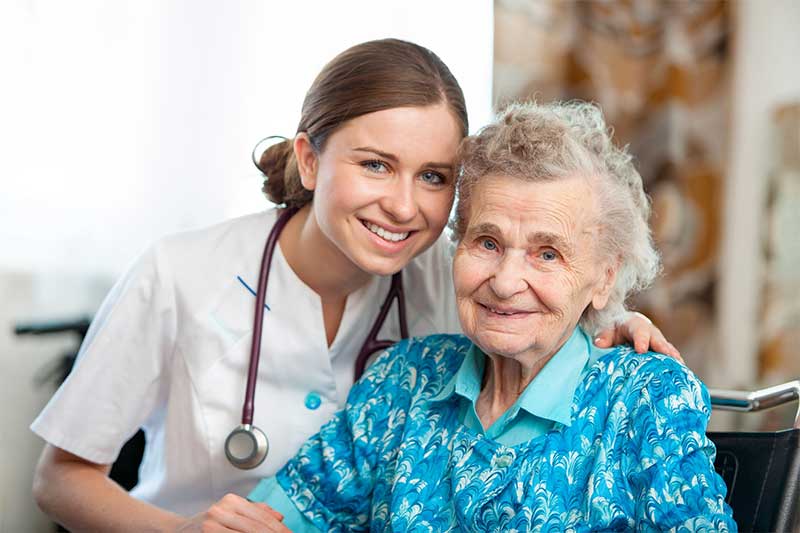 doctor and woman in a wheelchair