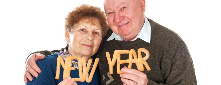 senior couple with letters