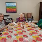 three women have lunch