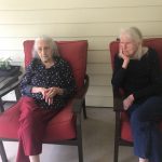 two women in armchairs